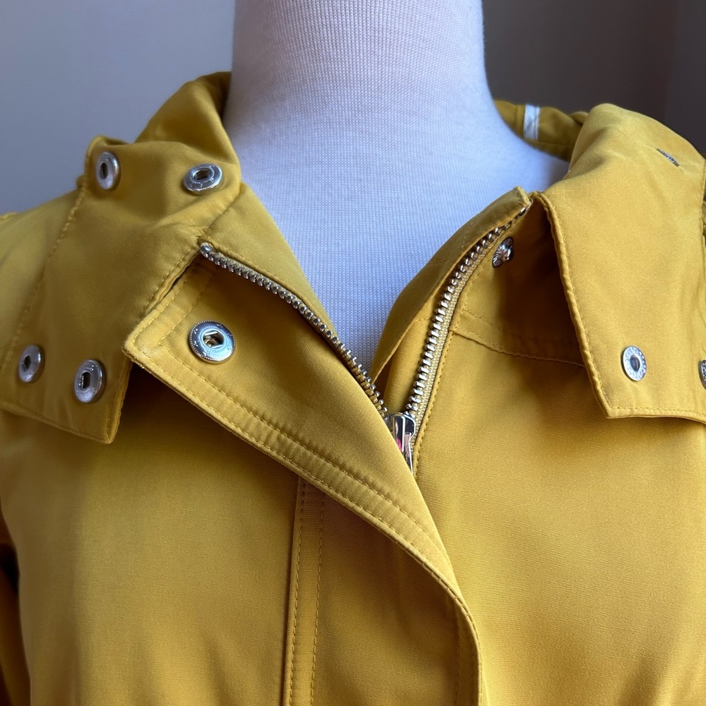 Brand new, never worn with tags. LOFT swing spring coat with hood.